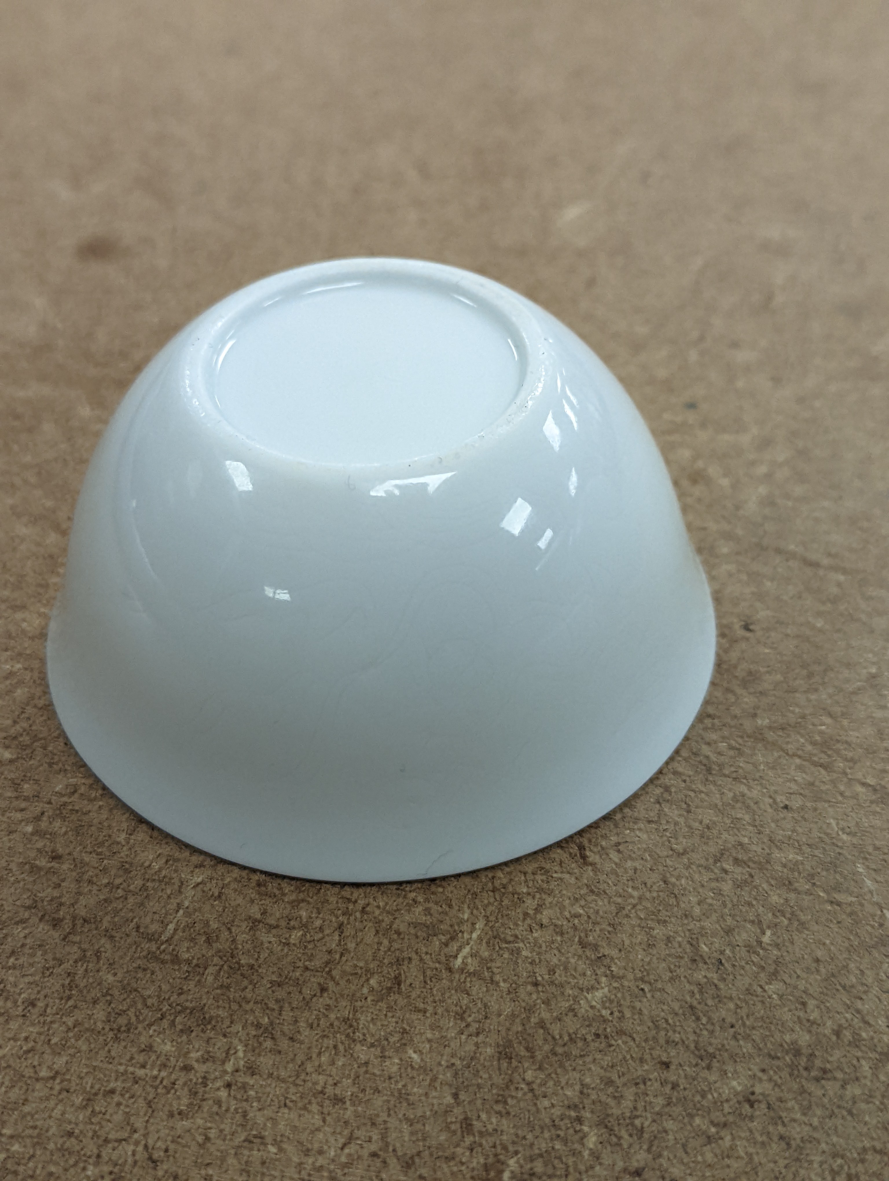 A Chinese white glazed water pot and a similar cup (2)